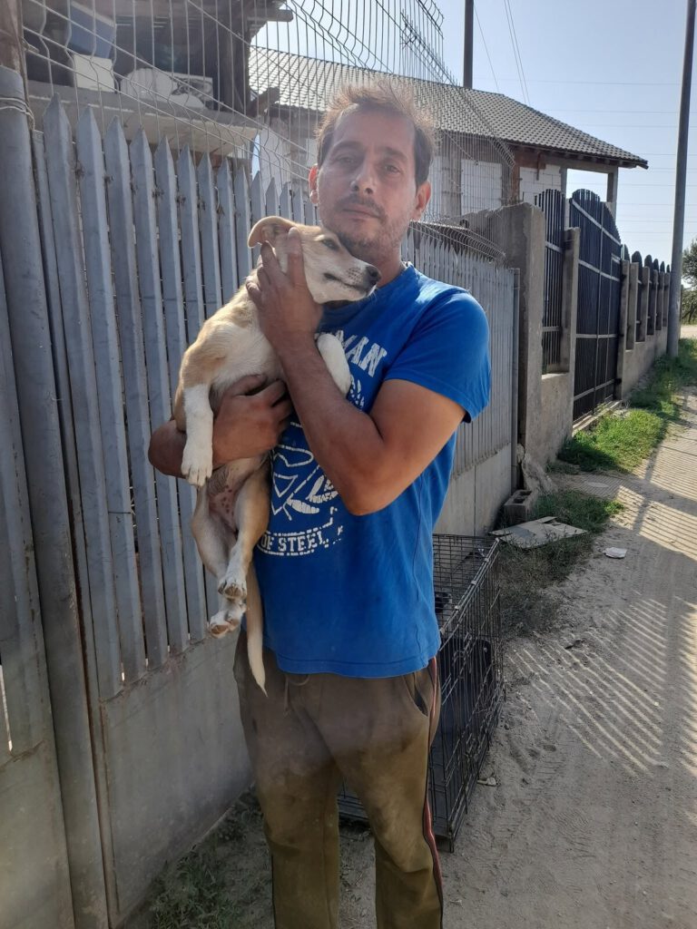 Florian met een pup in zijn armen